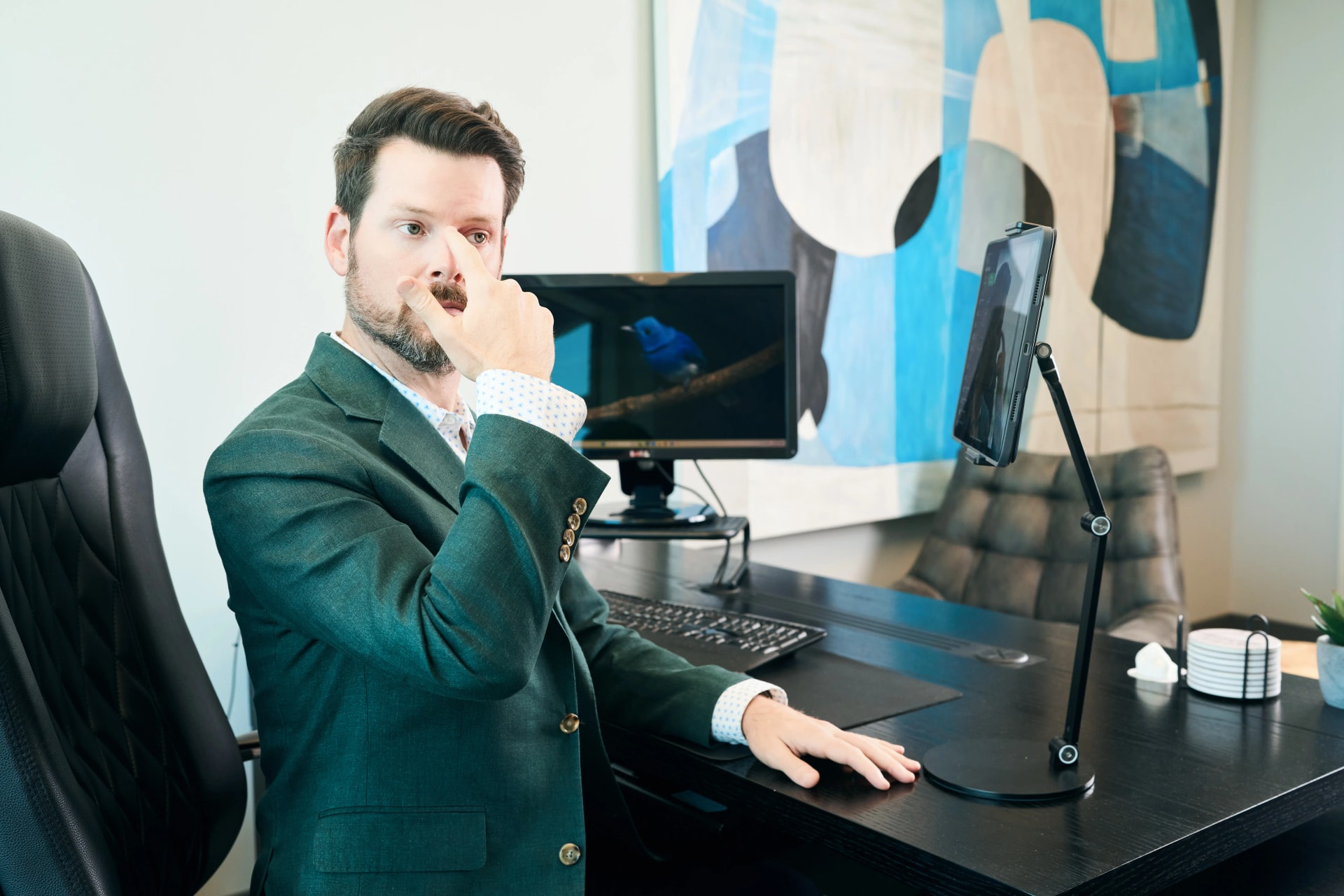 Facial Trauma: Dr. Bader in his office showcasing examples of facial trauma