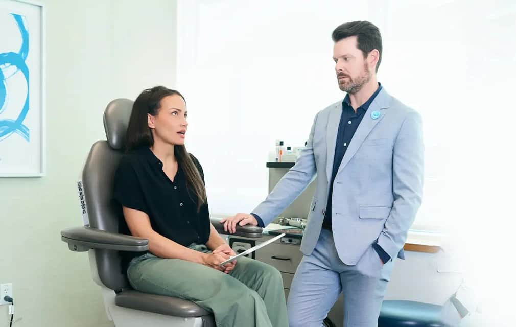 Chemical Peel: Doctor discussing skin treatment options with patient