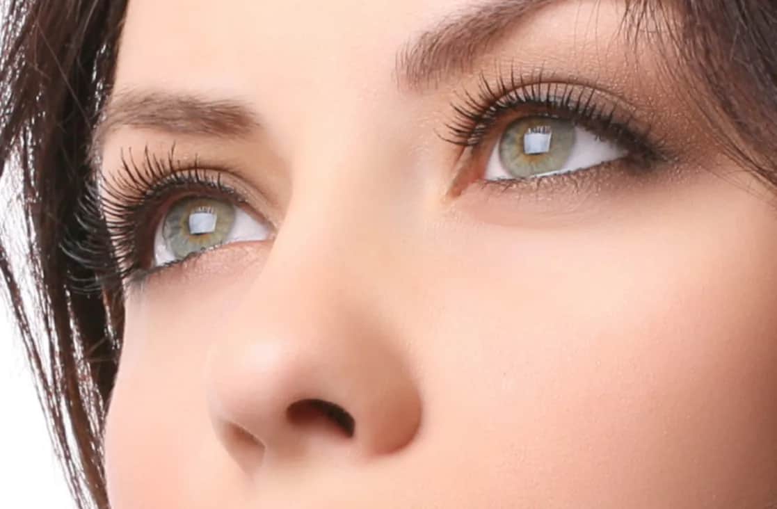 Alarplasty: Close up of womans eyes and nose