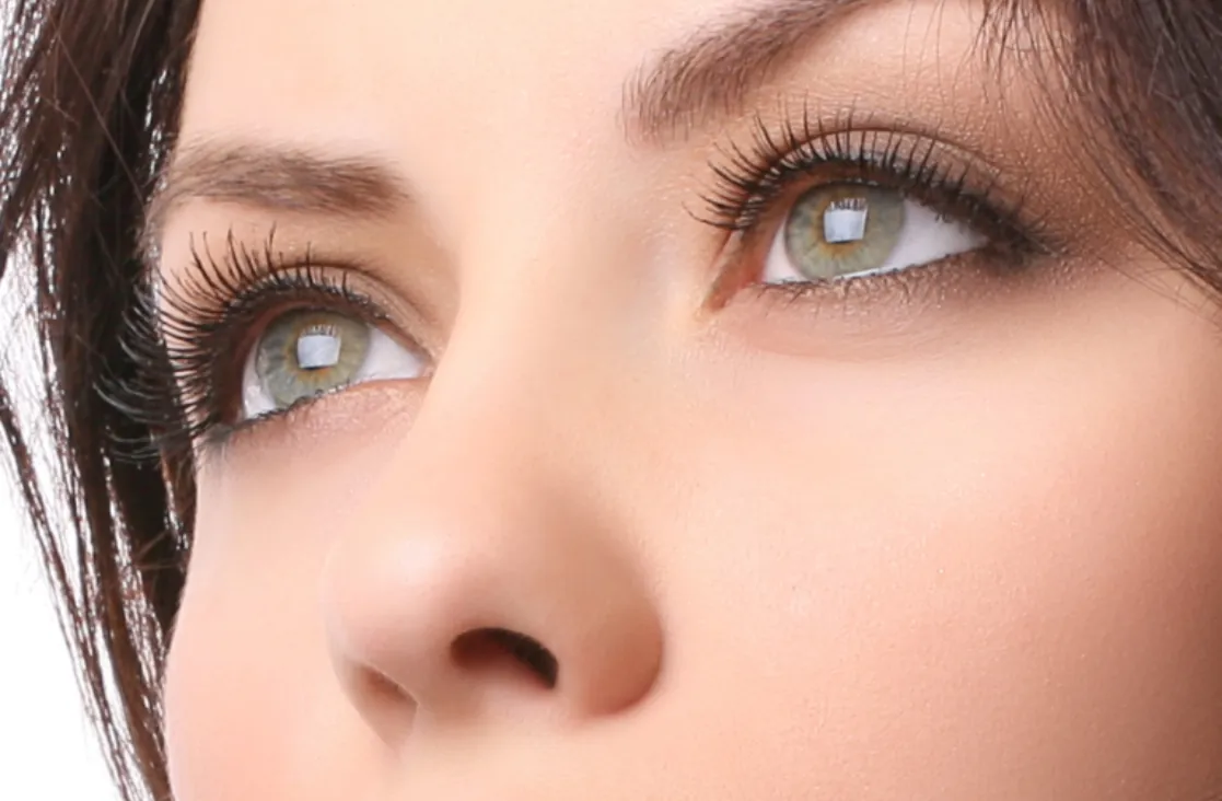 Alarplasty: Close up of womans eyes and nose