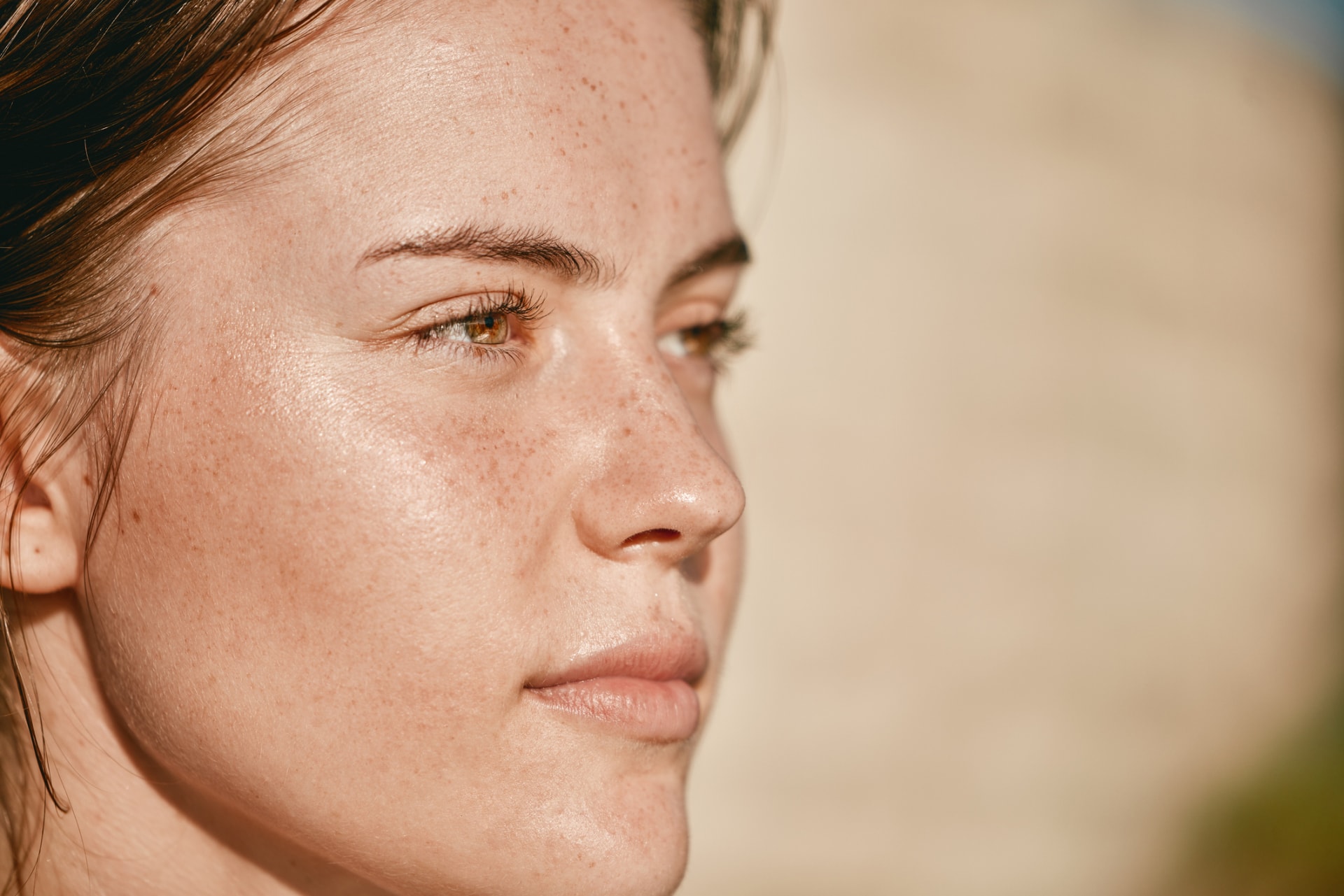 Profile of a woman with freckles