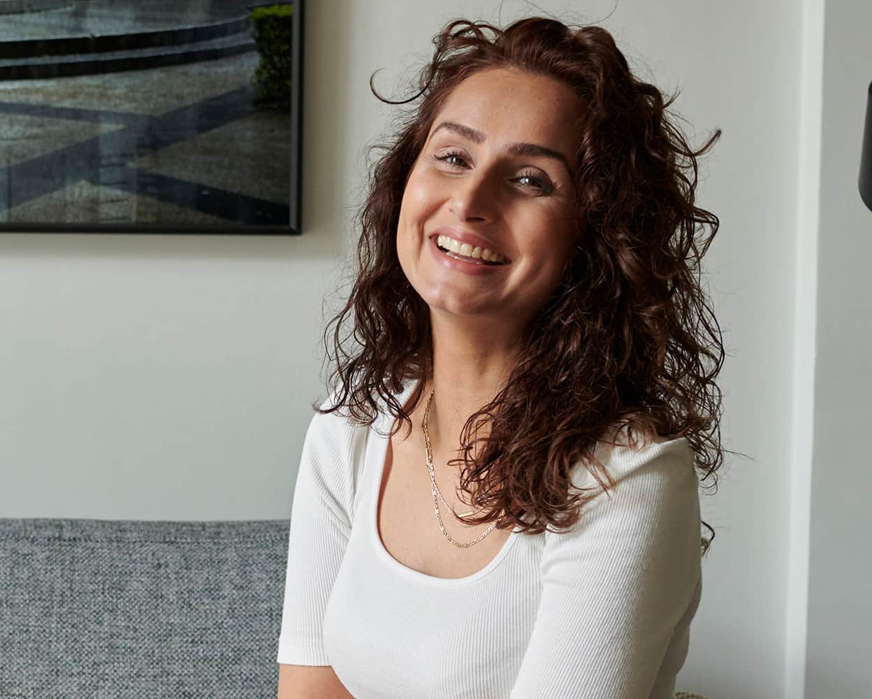 Woman with refreshed natural appearance representing results from expert deep plane facelift surgeon in Dallas providing long-lasting facial rejuvenation