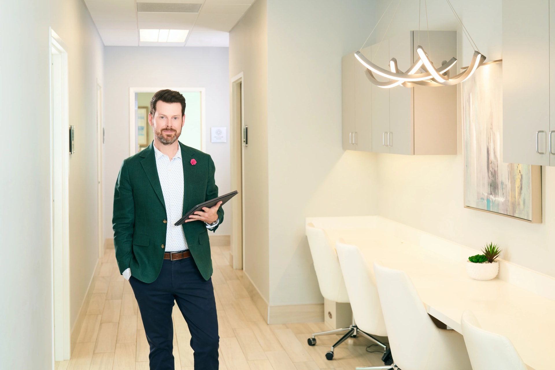 Facial Nerve Paralysis: Dr. Bader standing in his clinic