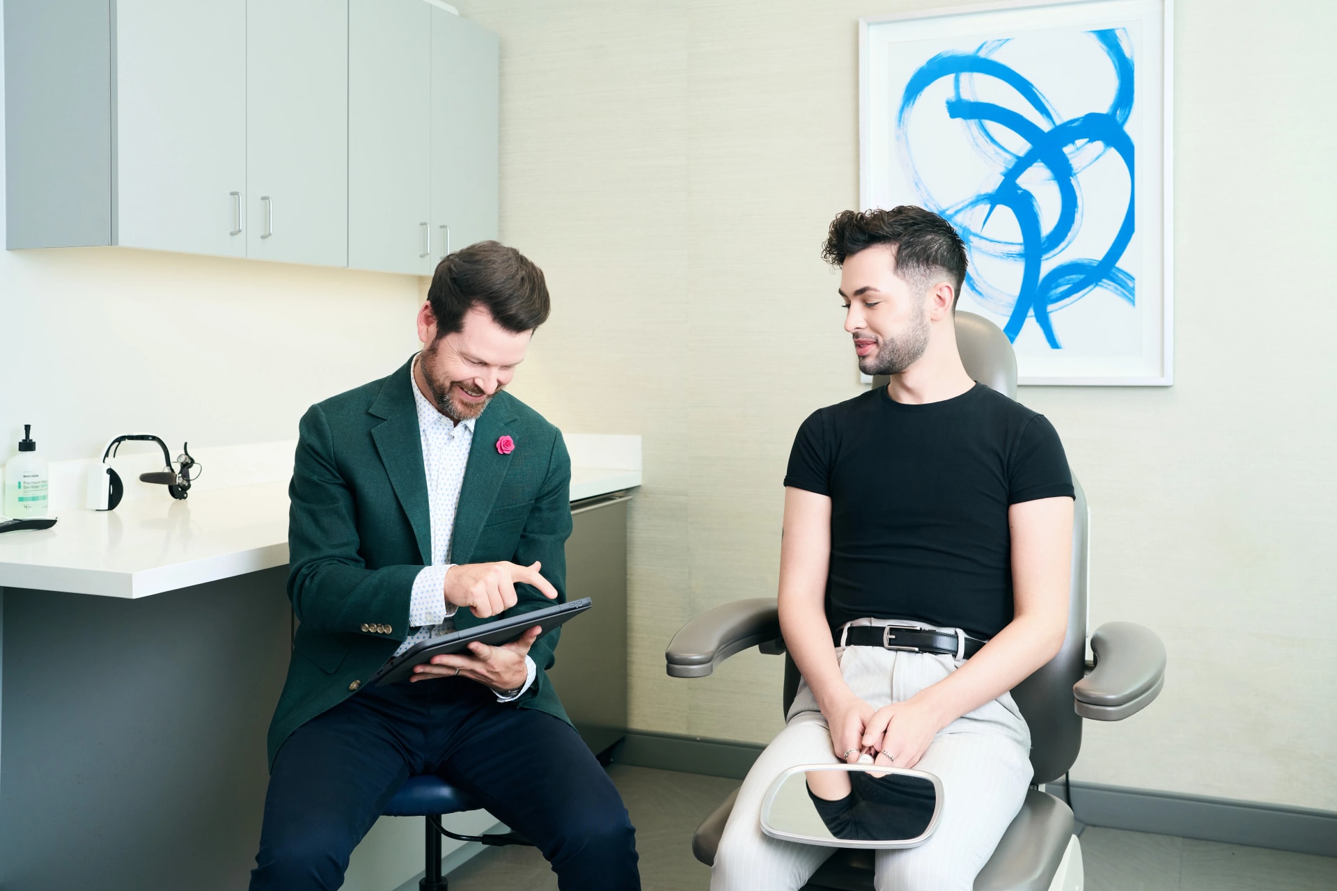 Facial Nerve Paralysis: Dr. Bader doing a consultation with a younf male patient in his office